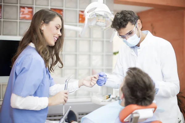 Young man having dental chekup — Stock Photo, Image