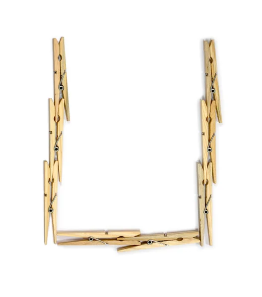 Clothespins postaci litera U — Zdjęcie stockowe