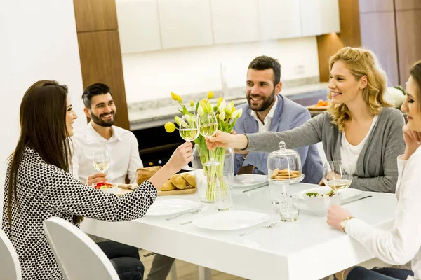 Friends having dinner at home — Stock Photo, Image