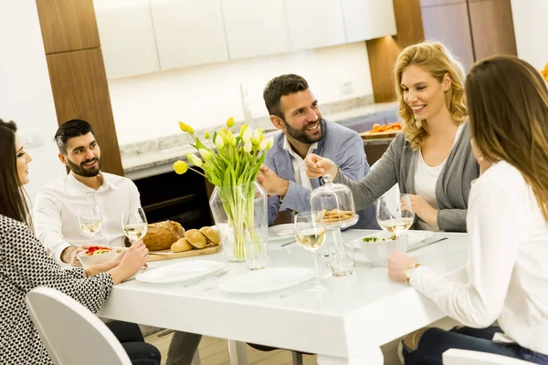 Friends having dinner at home — Stock Photo, Image