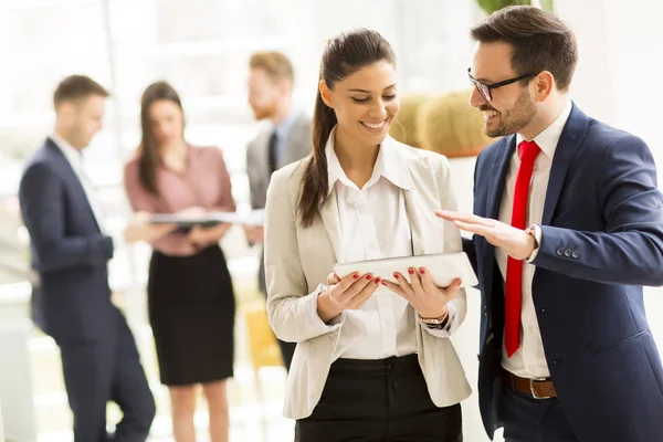 Business man and woman in office — Stock Photo, Image