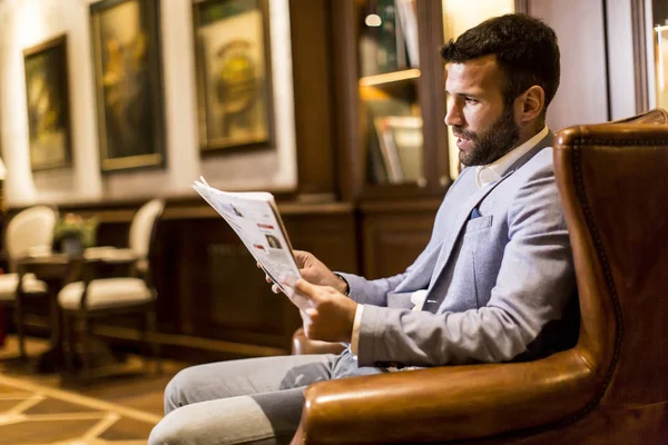 Modern businessman reading newspaper — Stock Photo, Image
