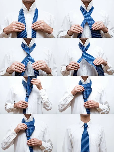 Młody człowiek pokazuje, jak wiązać krawat krok po kroku — Zdjęcie stockowe