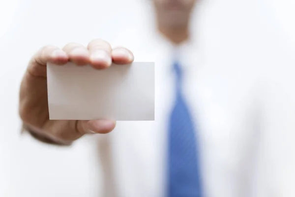 Businessman holding business card — Stock Photo, Image