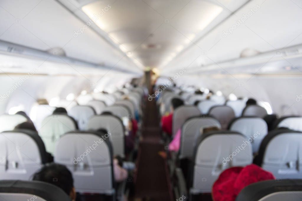 Passengers in airplane sears