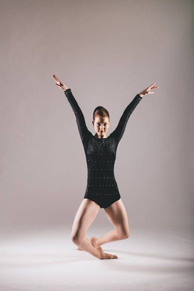 Young ballerina in the studio