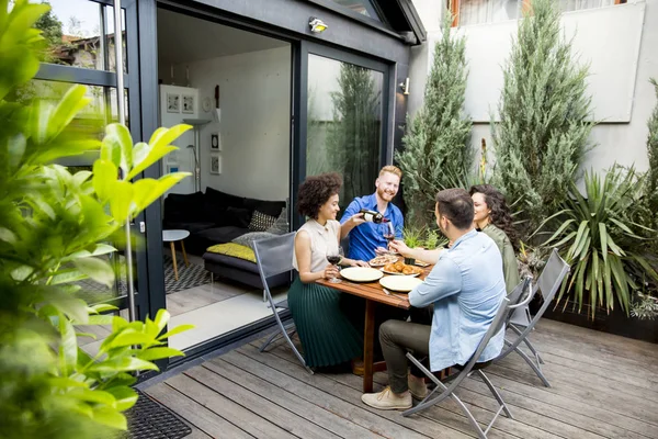 People have lunch in the courtyard