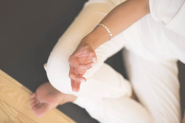 Woman practicing yoga at studio — Stock Photo, Image