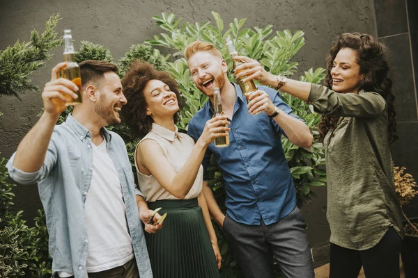 Friends having outdoor garden party