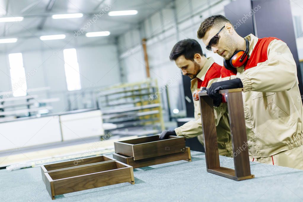 Young workers in a factory 