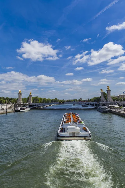 Tourist boat on river Seine — Stock Photo, Image