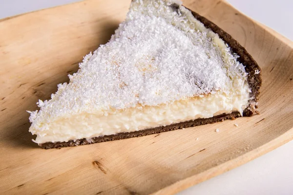 Coconut tart piece on plate — Stock Photo, Image