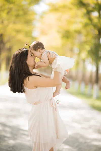 Young woman with baby girl — Stock Photo, Image
