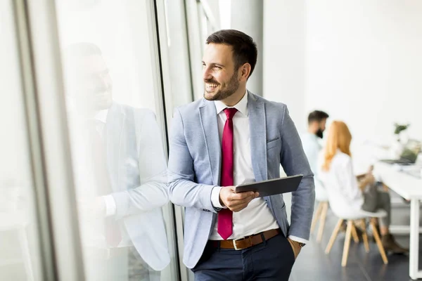 Young businessman in office — Stock Photo, Image