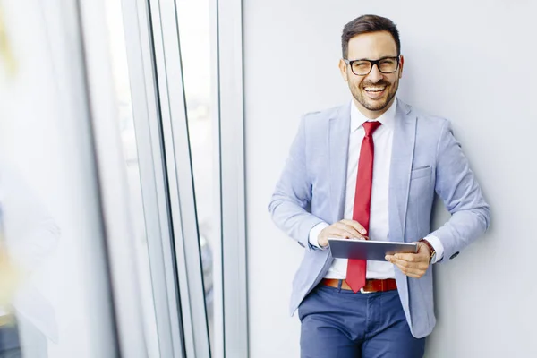 Young businessman in office — Stock Photo, Image