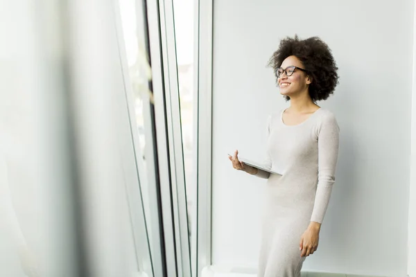 Young African American businesswoman in office — Stock Photo, Image