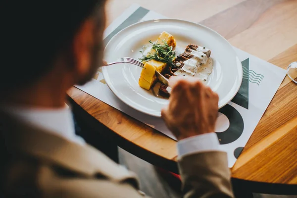 Handsome businessman having lunch wine in restaurant — Stock Photo, Image