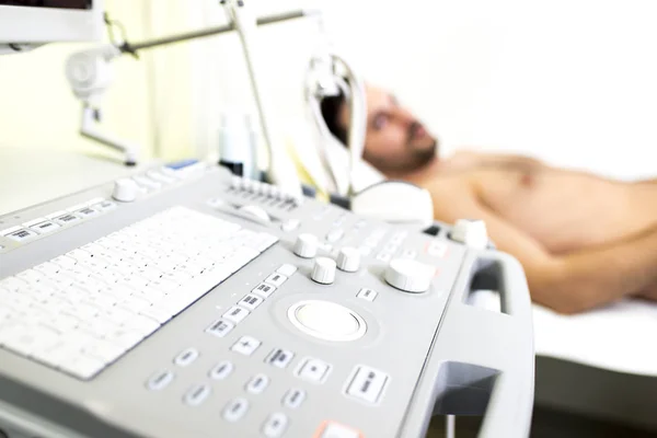 Young male patient in the ultrasound examination — Stock Photo, Image