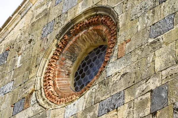 Detalhe da antiga igreja em Monteriggioni, Itália — Fotografia de Stock