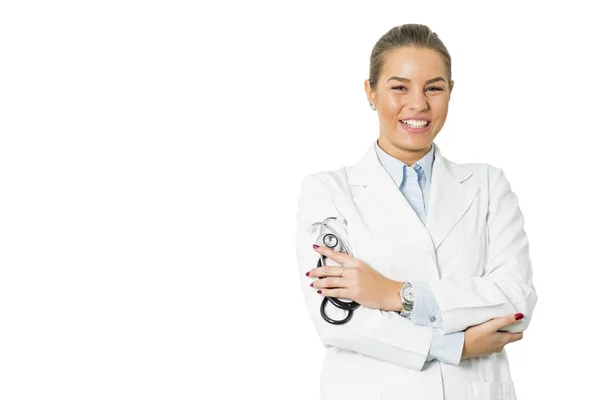 Mooie jonge vrouwelijke arts op de witte achtergrond — Stockfoto