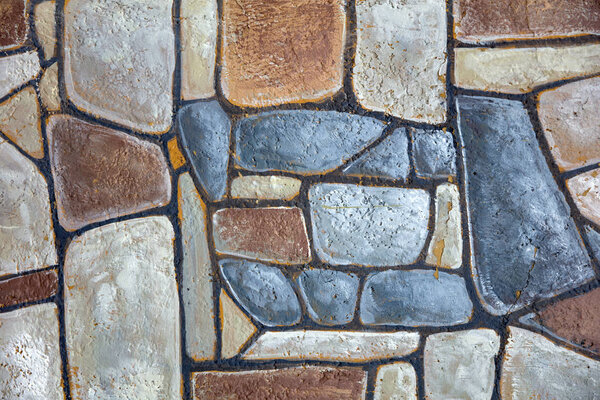 Detail of the decorative irregular colorful stone mosaic