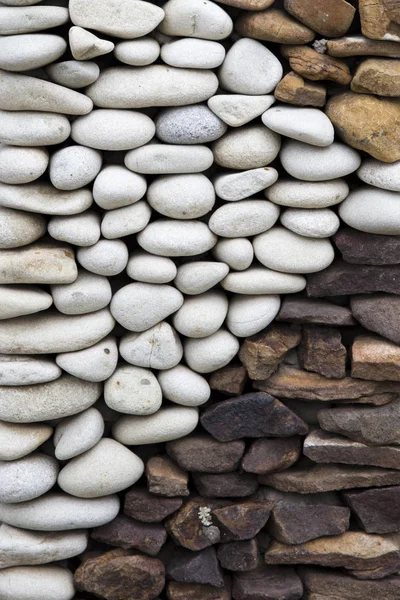 Closeup detail of the pebbles stone road backdrop