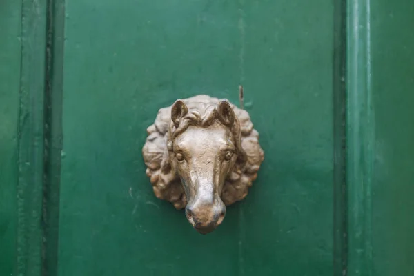 Old vintage door handle from Florence, Italy