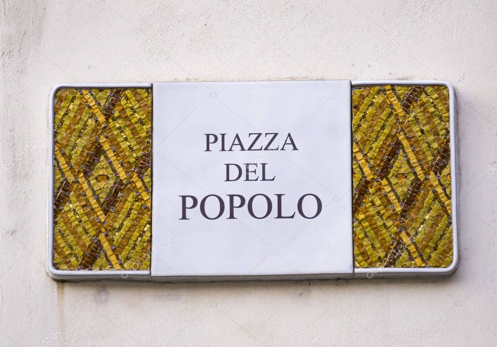 Decorative street sign on the building from Ravenna, Italy