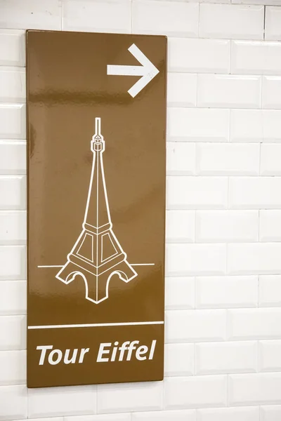 Direction sign to Eiffel tower in Paris, France