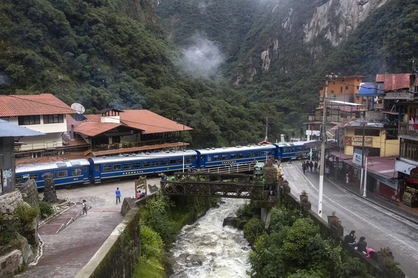 stock image AGUAS CALIENTES, PERU - JANUARY 5, 2018: PeruRail train at Aguas Calientes, Peru. PeruRail was founded in 1999.