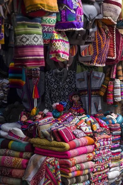 Colorful traditional peruvian fabrics on the market in Cusco, Peru