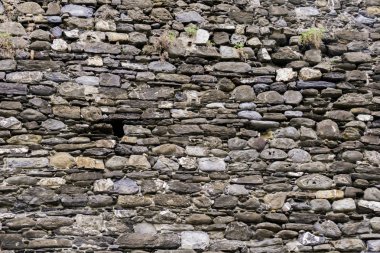 Eski taş duvar doku manzaraya kadar kapatın