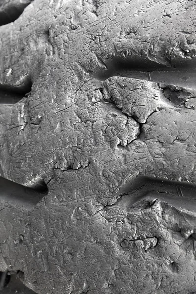 Big black truck wheel tire abstract closeup backdrop