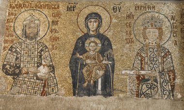 ISTANBUL, TURKEY - NOVEMBER 10, 2019: Fresco Emperor John II Komnenos and Empress Irene in Hagia Sophia, Istanbul, Turkey. For almost 500 years, Hagia Sophia served as a model for many other Ottoman mosques. clipart