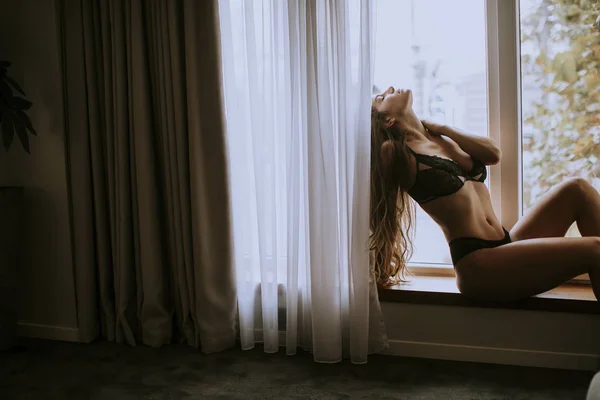 Beautiful Young Woman Lingerie Sitting Looking Window Her Beautiful Apartment — 스톡 사진