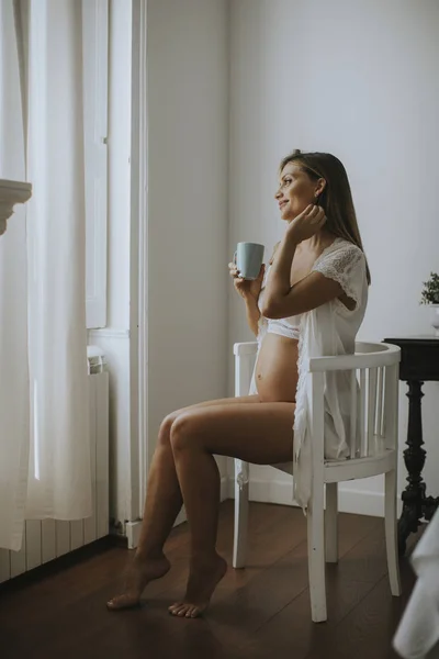 Happy Pregnant Woman Mug Tea Milk Sitting Room — 스톡 사진