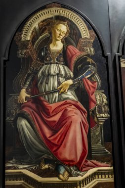 FLORENCE, ITALY - APRIL 7, 2018: Fortitude, from panels depicting the Virtues in Uffizi Gallery in Florence, Italy. It is painted by Sandro Botticelli at 1470 for Council Chamber of the Merchant.