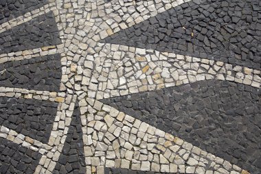 Eski taş kaldırımın tıkanmış deseninin yakın yüzeyi