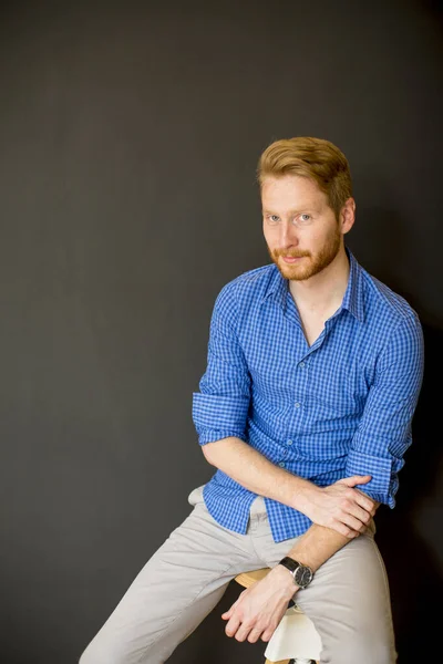 Handsome Young Redhair Man Sitting Wall — Stock Photo, Image