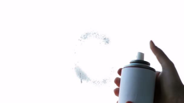 Child hand painting a sun at window with white spray — Stock Video