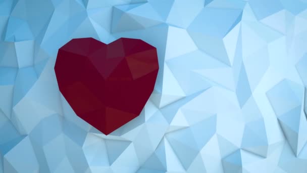 Smiling woman holding red polygonal paper heart shape — Stock Video