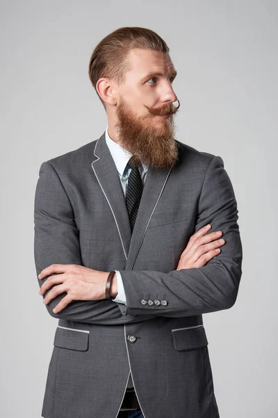 Hipster business man ser att sida — Stockfoto