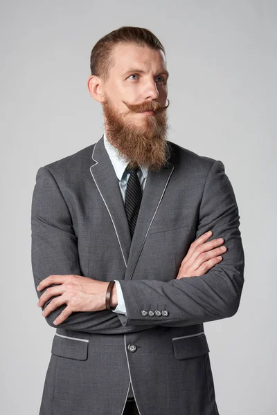 Hipster uomo d'affari guardando fuori dalla cornice — Foto Stock