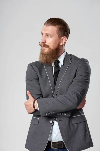 Hipster business man ser att sida — Stockfoto