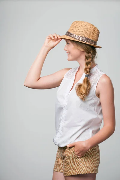 Smiling woman wearing summer straw fedora hat — Stock Photo, Image