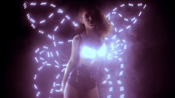 Dancer performing in led costume with butterfly wings — Stock Video