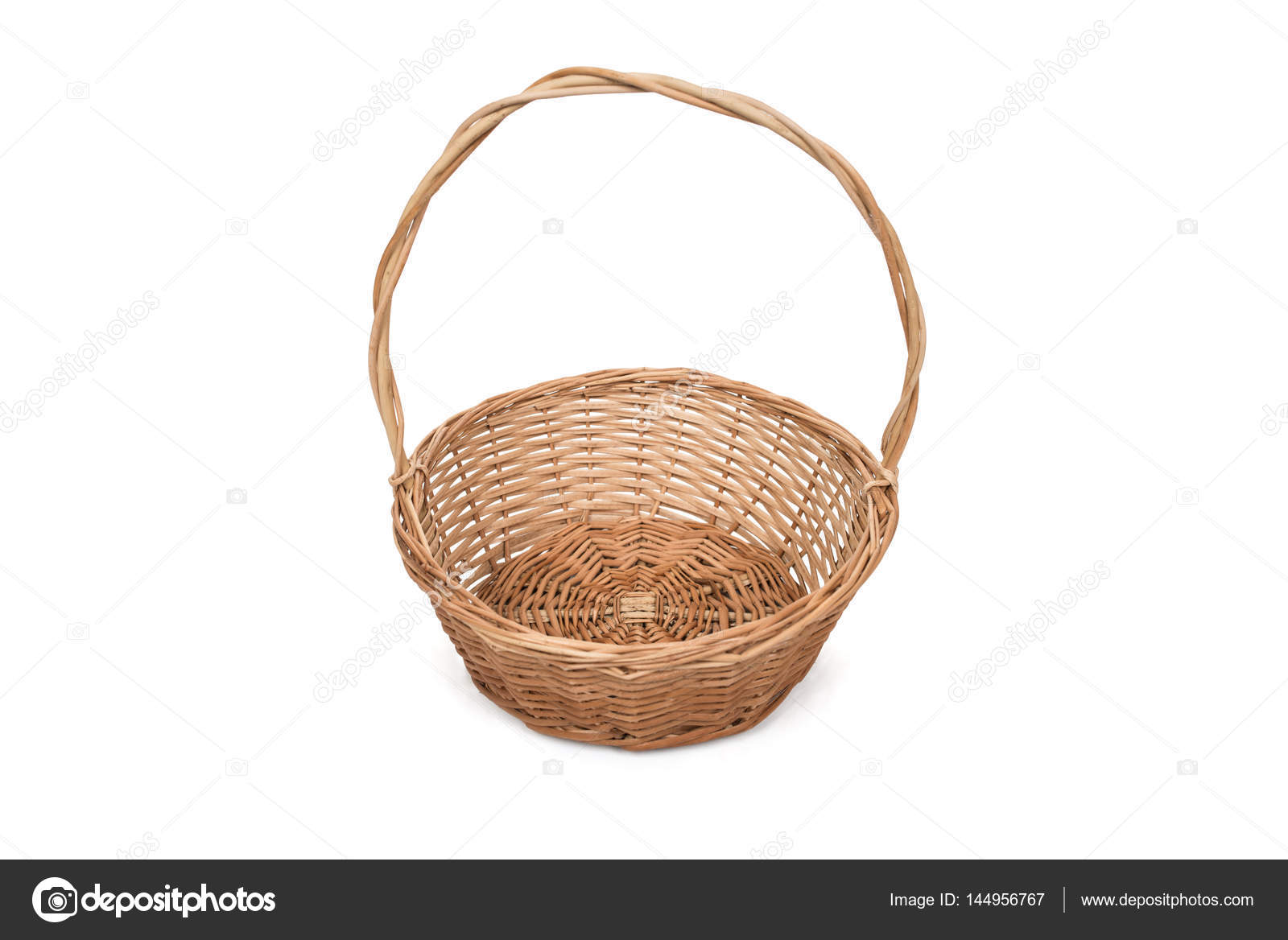 Empty wicker basket with long handle Stock Photo by ©pavel_kolotenko