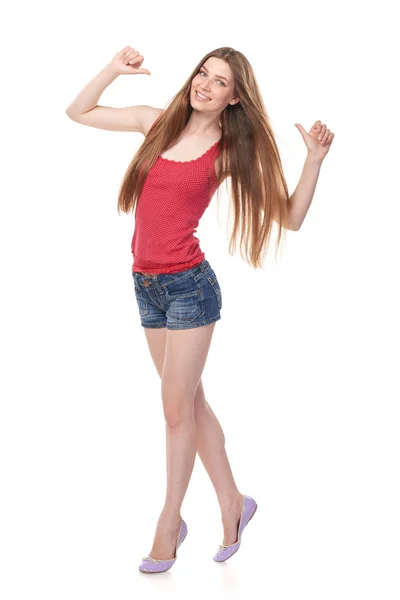 Full length happy female pointing fingers at herself — Stock Photo, Image