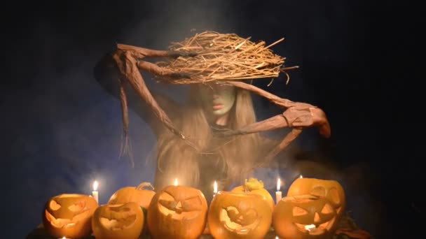 Halloween costume woman, tree girl with pumpkins — Stock Video