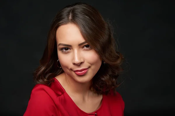 Woman in red shirt and wavy hair — Stock Photo, Image